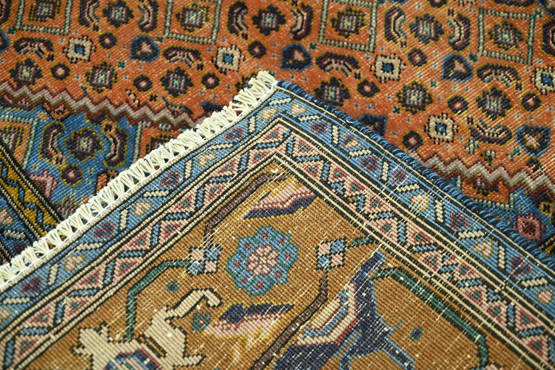 orange Medium rug 6' 3" x 9' 1"