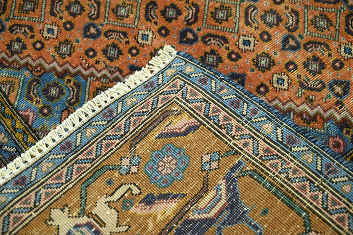 orange Medium rug 6' 3" x 9' 1"