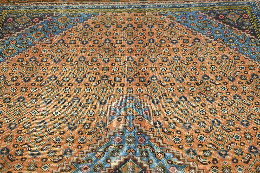 orange Medium rug 6' 3" x 9' 1"