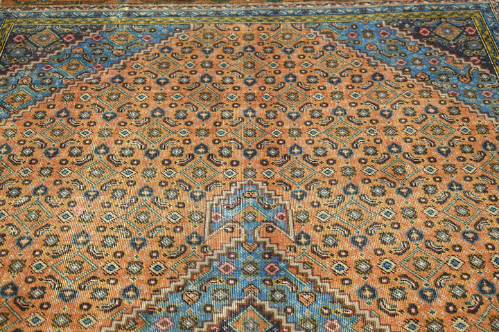orange Medium rug 6' 3" x 9' 1"
