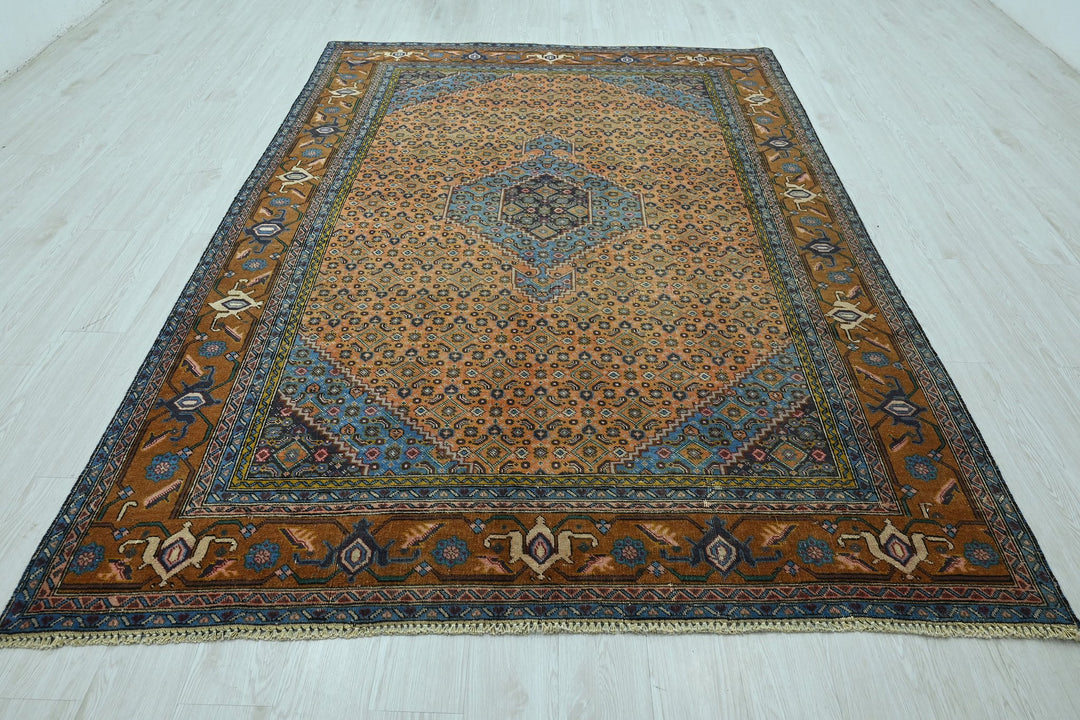 orange Medium rug 6' 3" x 9' 1"
