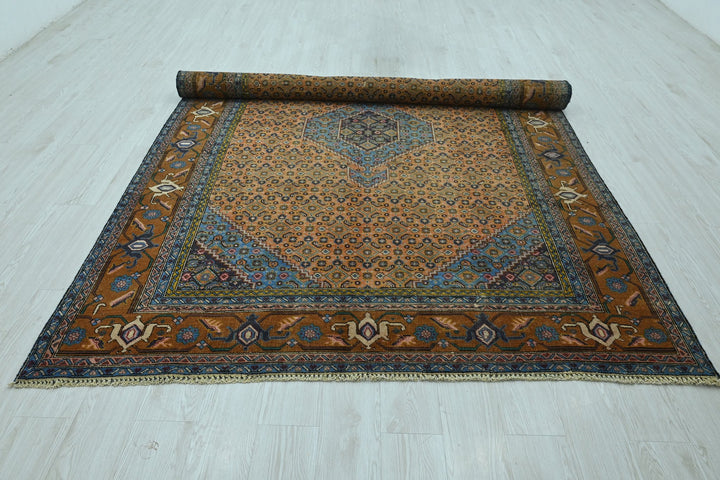 orange Medium rug 6' 3" x 9' 1"