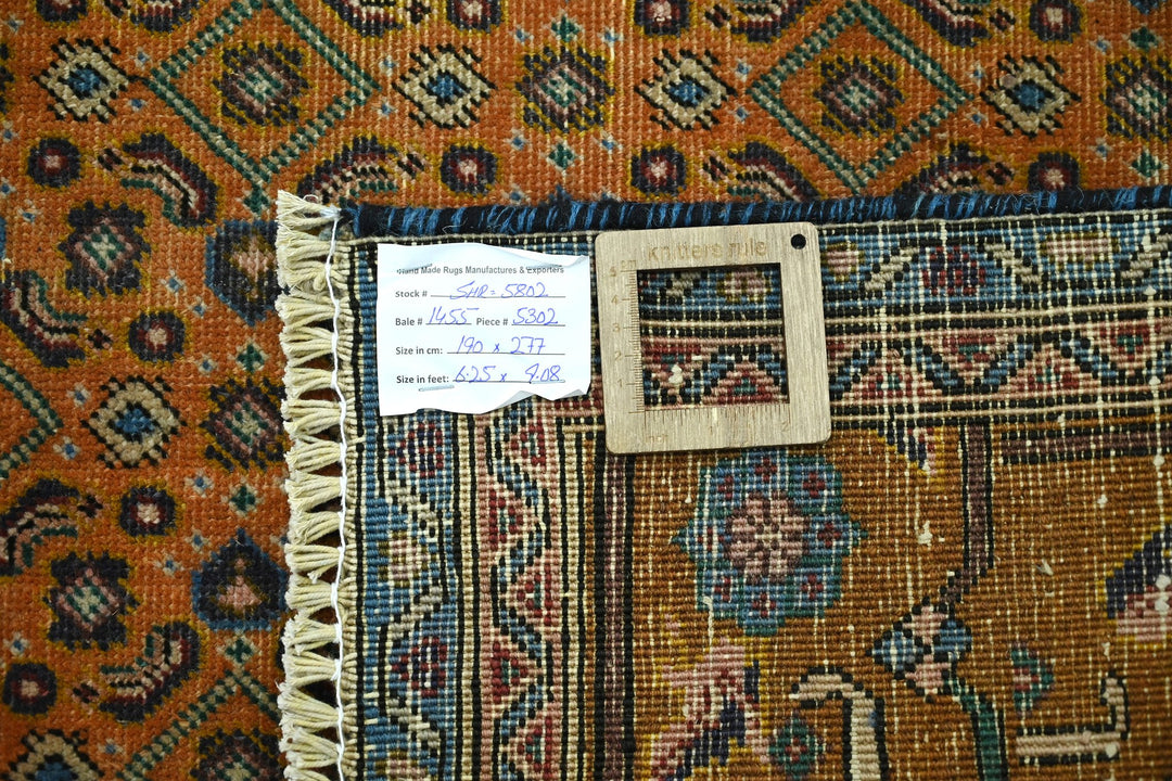 orange Medium rug 6' 3" x 9' 1"