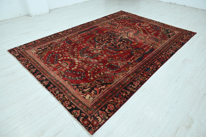 red Large rug 6' 7" x 9' 10"