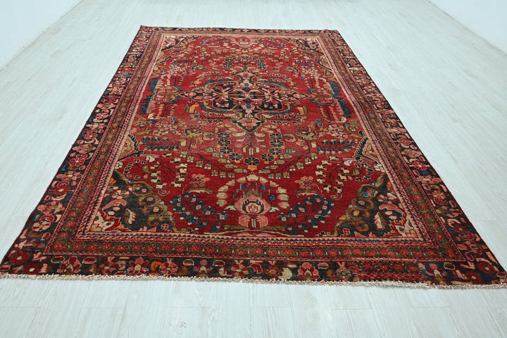 red Large rug 6' 7" x 9' 10"