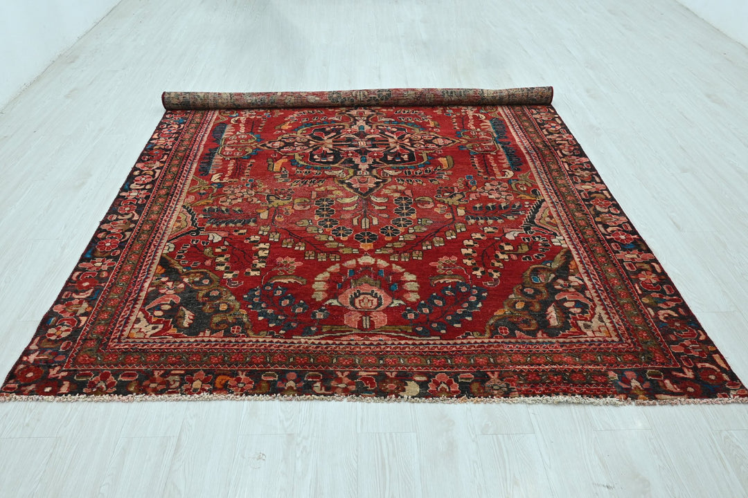 red Large rug 6' 7" x 9' 10"