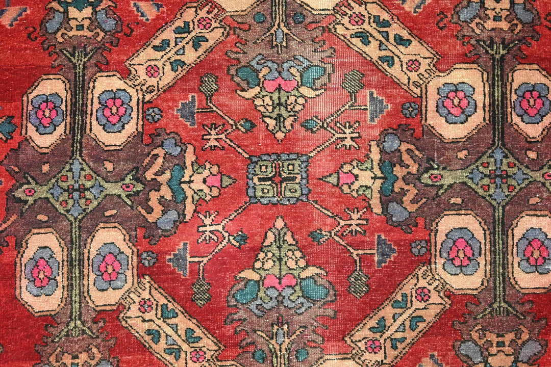 red Large rug 5' 5" x 9' 10"