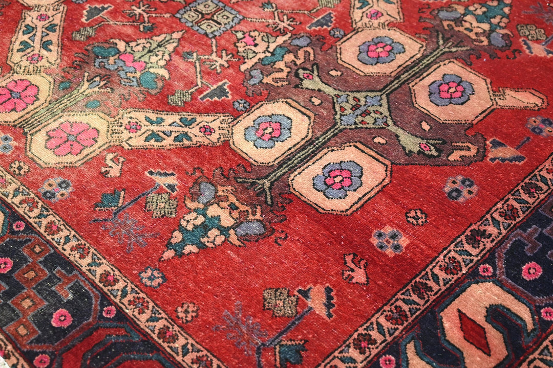red Large rug 5' 5" x 9' 10"