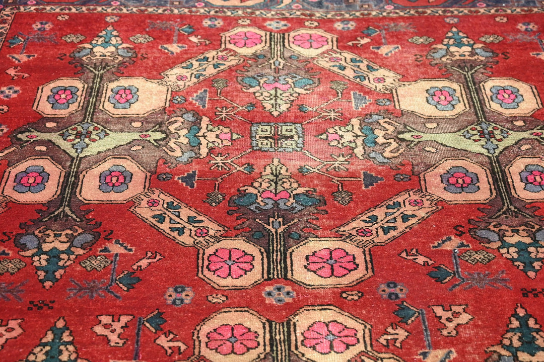 red Large rug 5' 5" x 9' 10"