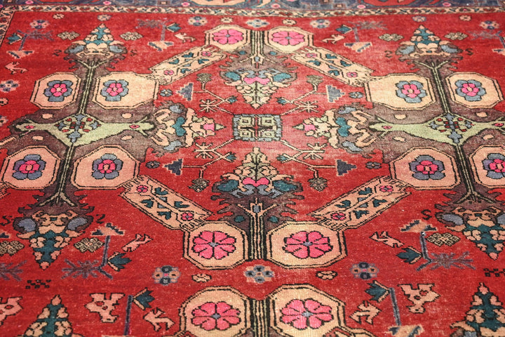 red Large rug 5' 5" x 9' 10"