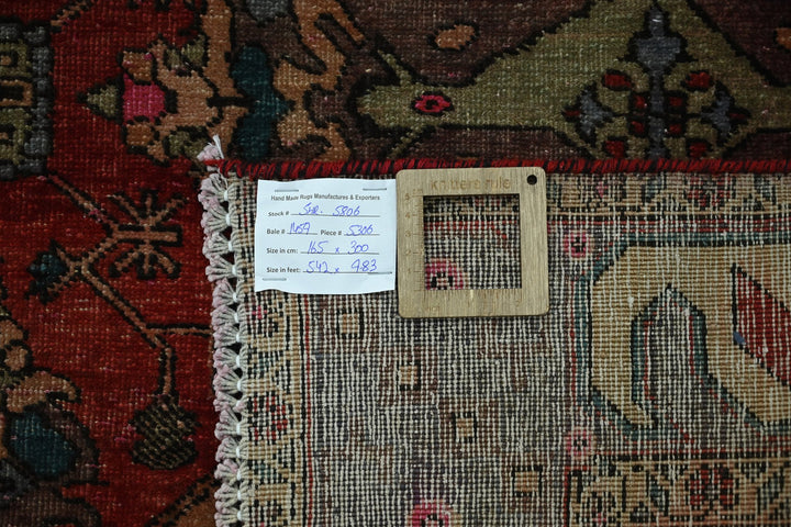 red Large rug 5' 5" x 9' 10"
