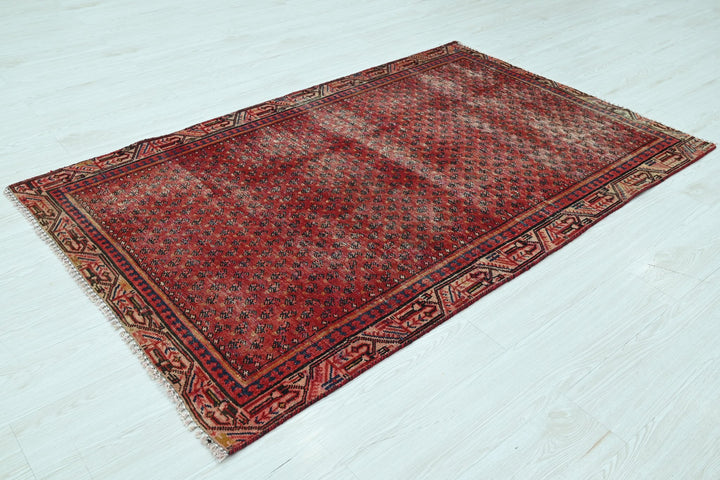 red Accent rug 3' 10" x 6' 2"