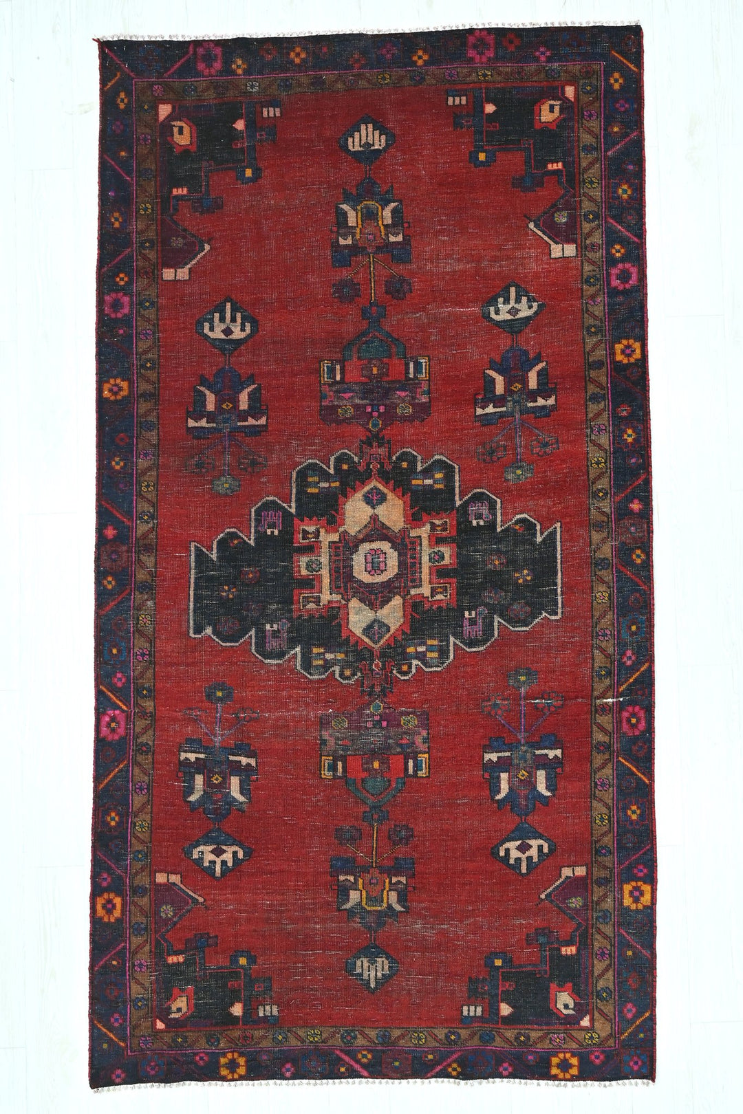 red Medium rug 4' 8" x 8' 10"