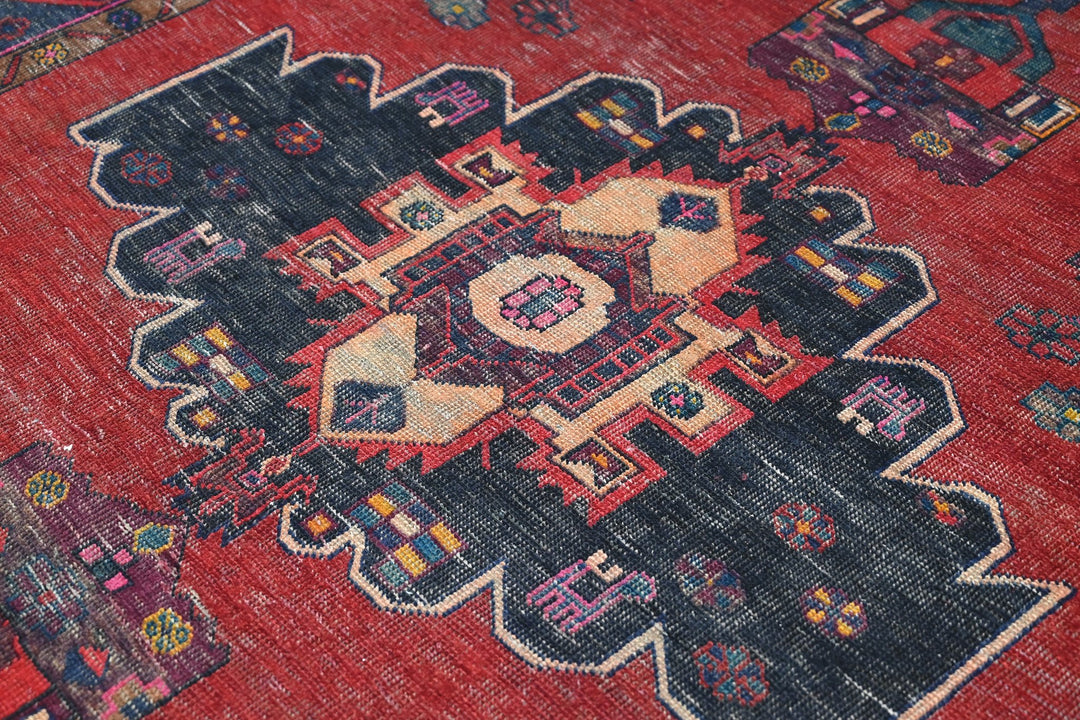 red Medium rug 4' 8" x 8' 10"