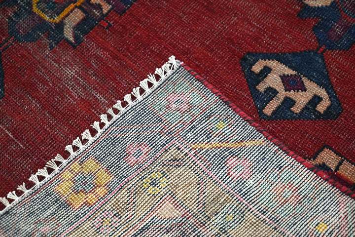 red Medium rug 4' 8" x 8' 10"