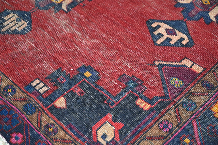 red Medium rug 4' 8" x 8' 10"