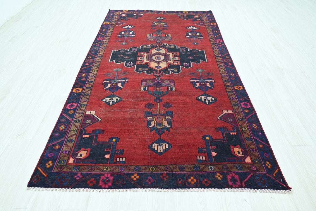 red Medium rug 4' 8" x 8' 10"