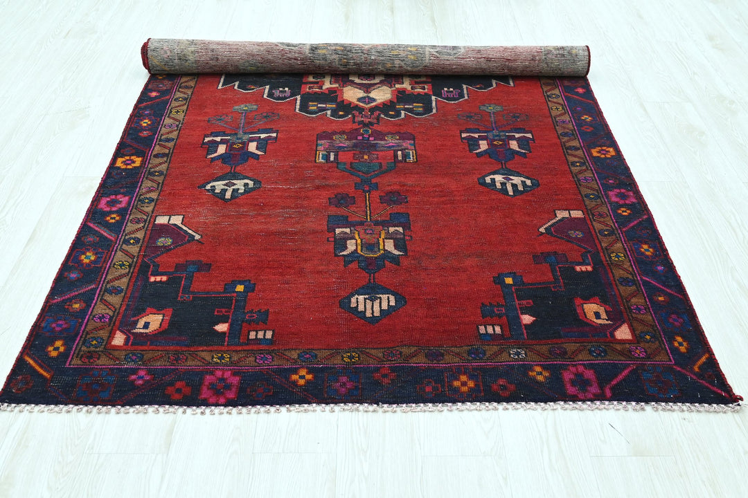 red Medium rug 4' 8" x 8' 10"