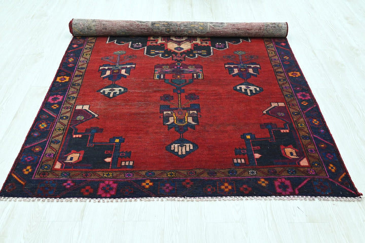 red Medium rug 4' 8" x 8' 10"