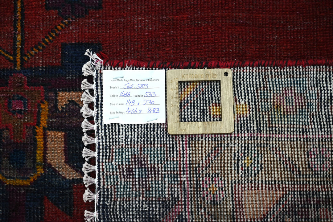 red Medium rug 4' 8" x 8' 10"