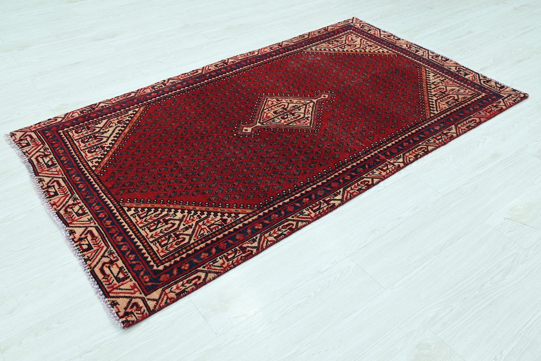 red Accent rug 3' 7" x 6' 5"