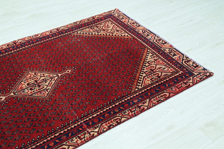 red Accent rug 3' 7" x 6' 5"