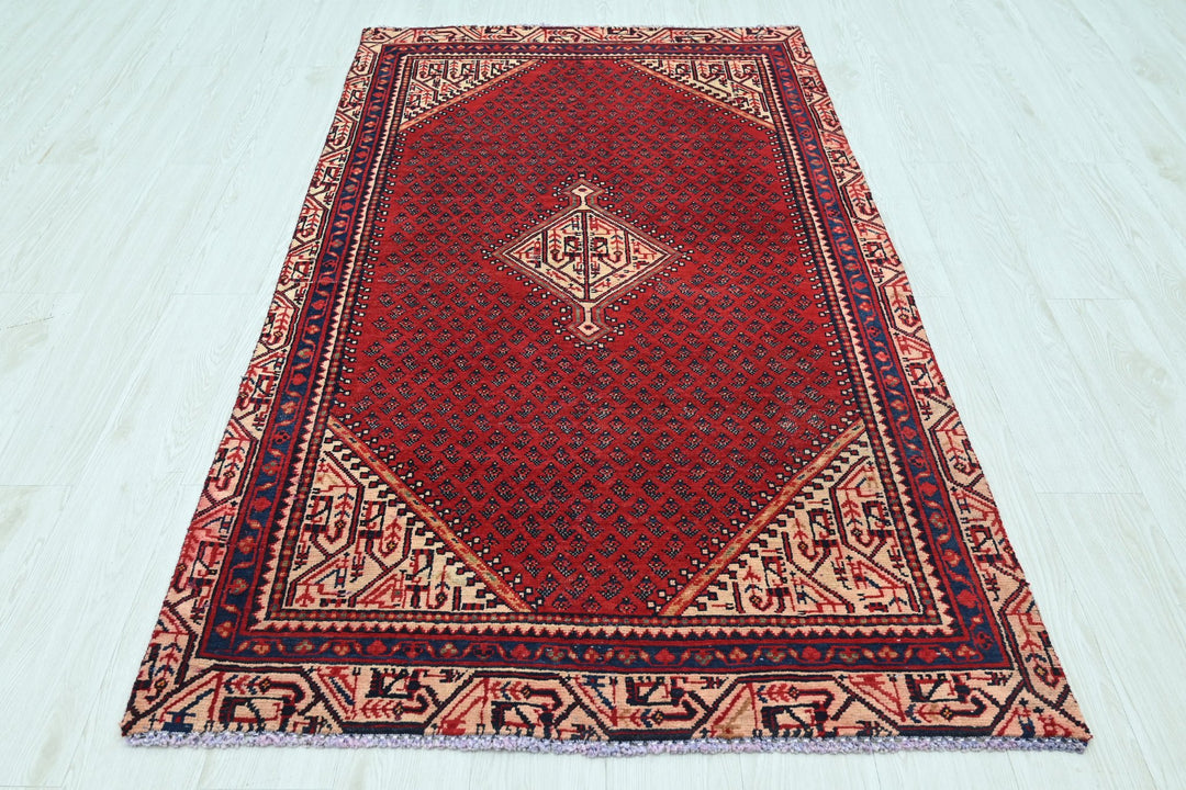 red Accent rug 3' 7" x 6' 5"