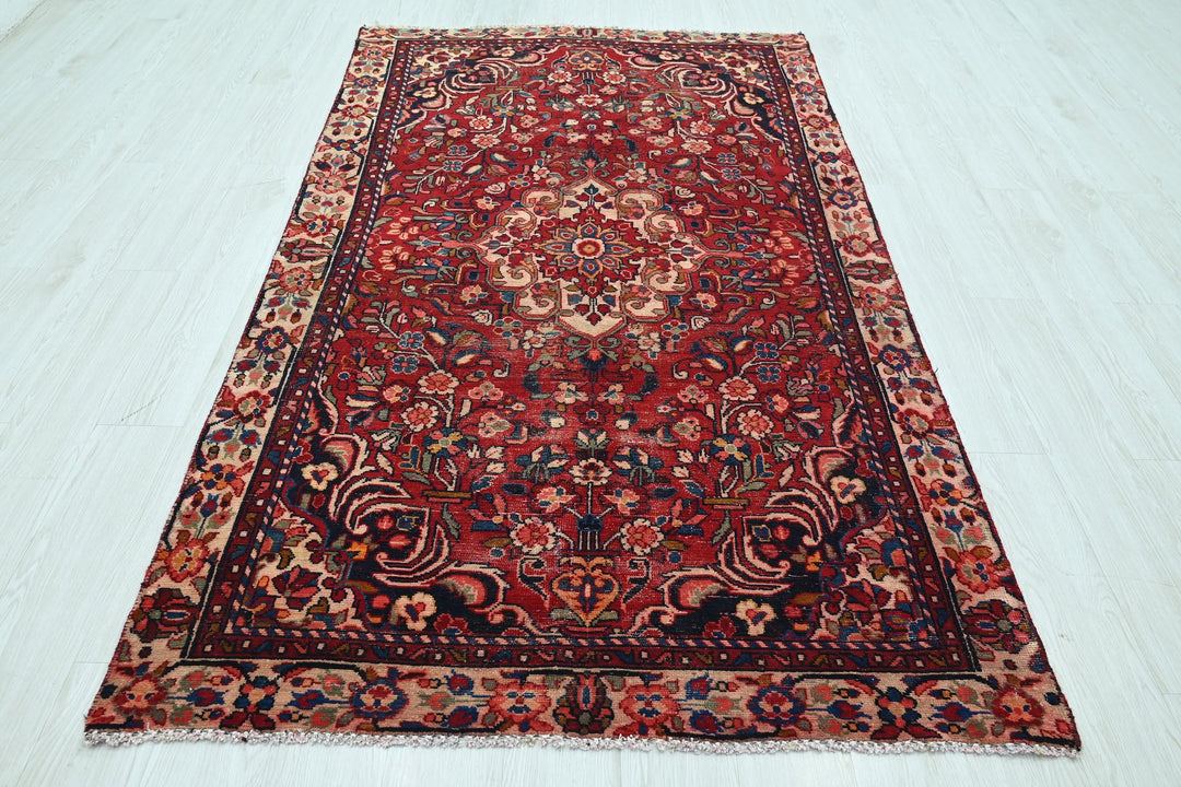 red Medium rug 4' 5" x 7' 9"
