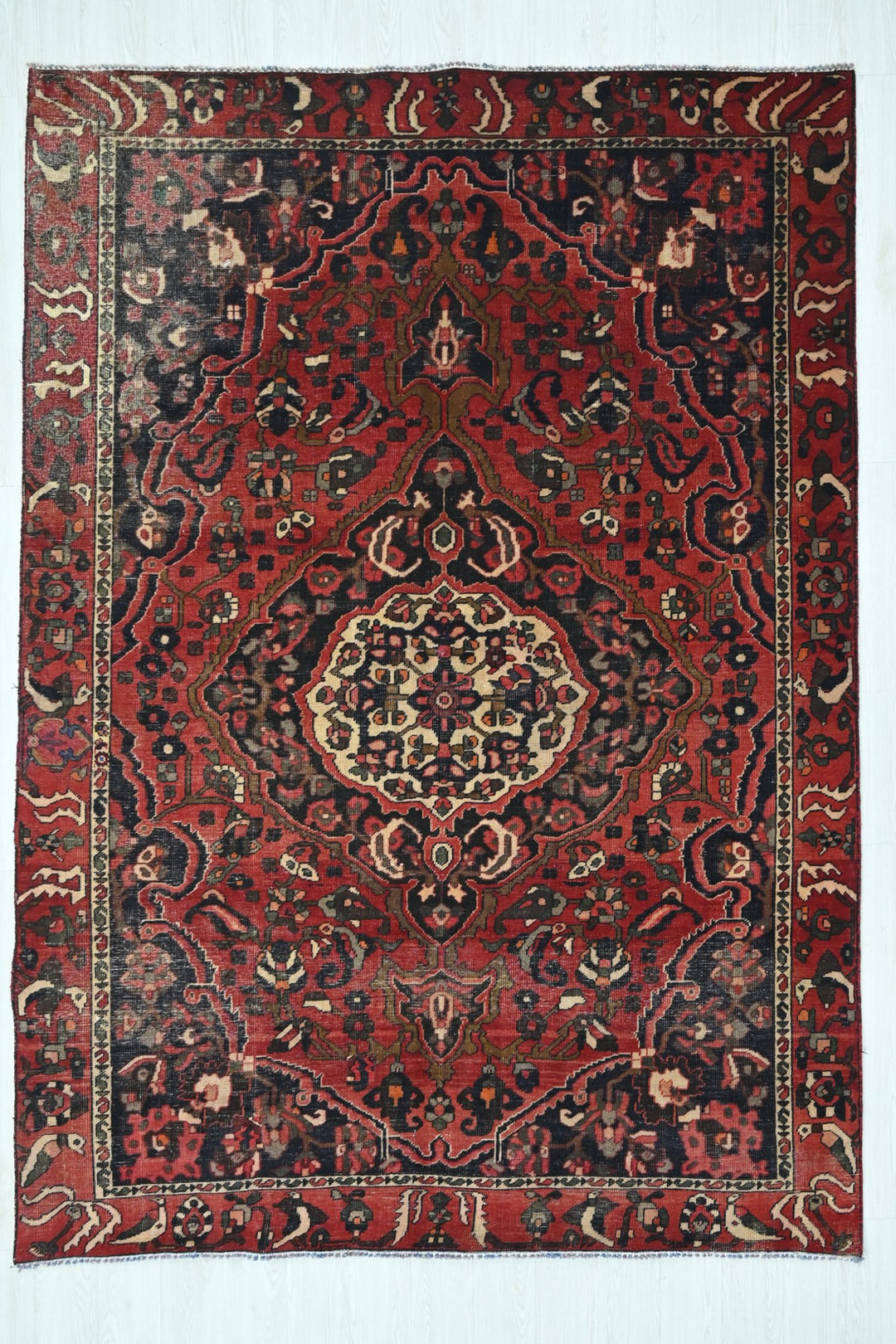 red Large rug 6' 8" x 9' 2"