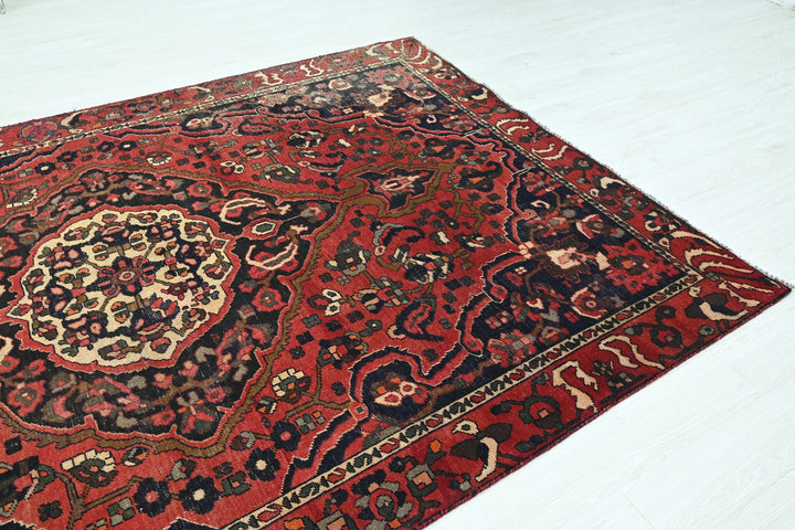 red Large rug 6' 8" x 9' 2"