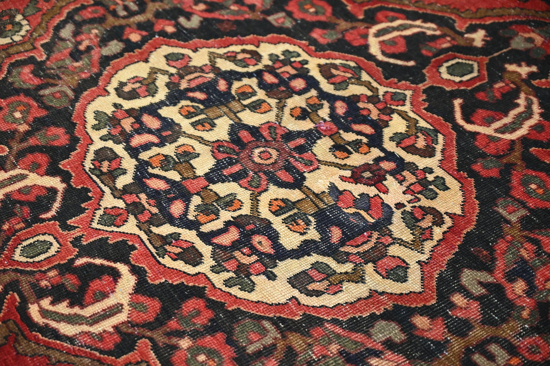 red Large rug 6' 8" x 9' 2"