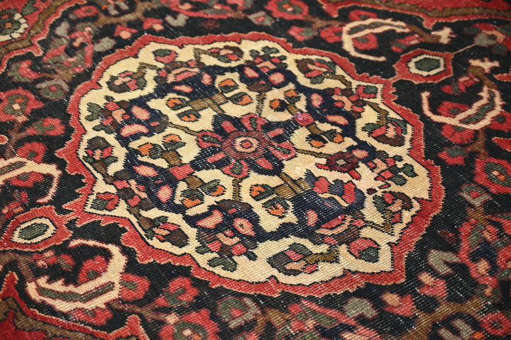 red Large rug 6' 8" x 9' 2"