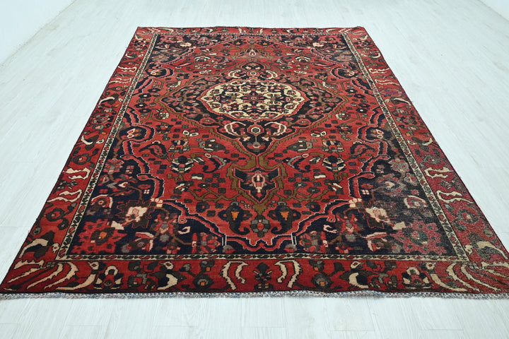 red Large rug 6' 8" x 9' 2"