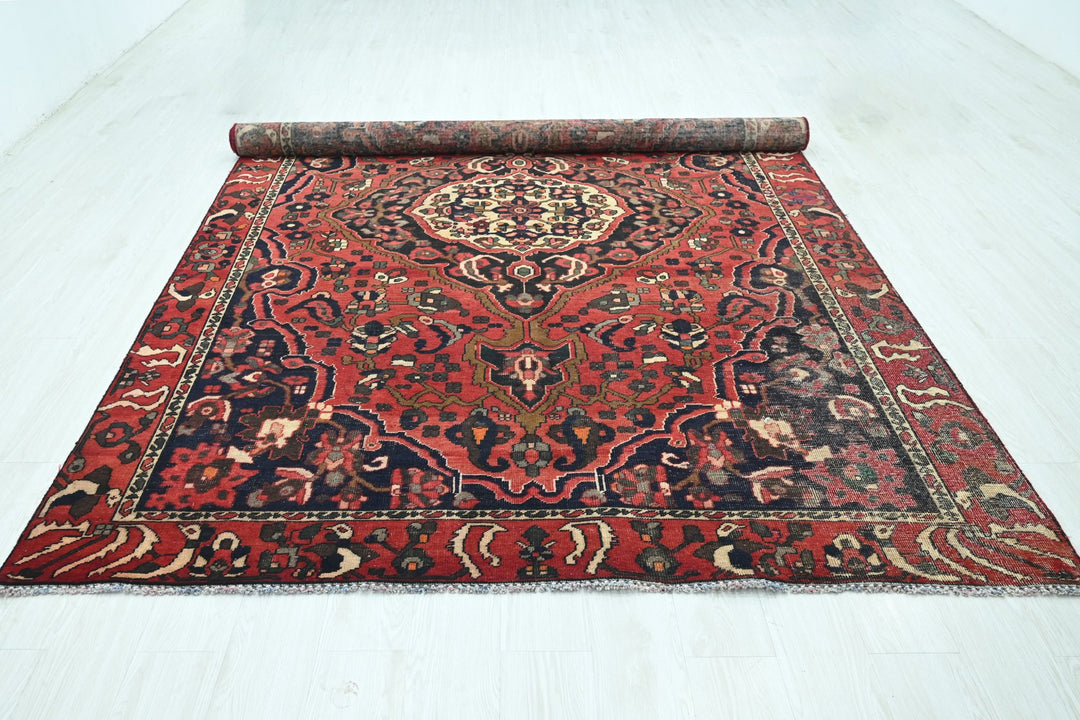 red Large rug 6' 8" x 9' 2"