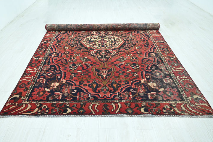 red Large rug 6' 8" x 9' 2"