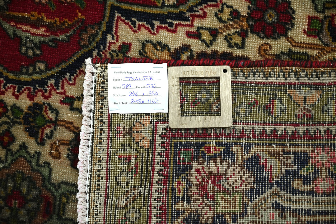 red Large rug 8' 1" x 11' 6"