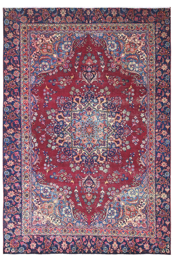 red Large rug 7' 1" x 10' 5"