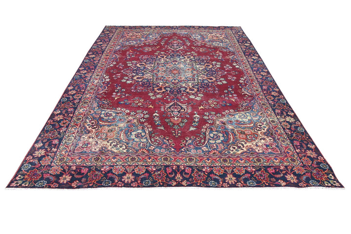 red Large rug 7' 1" x 10' 5"