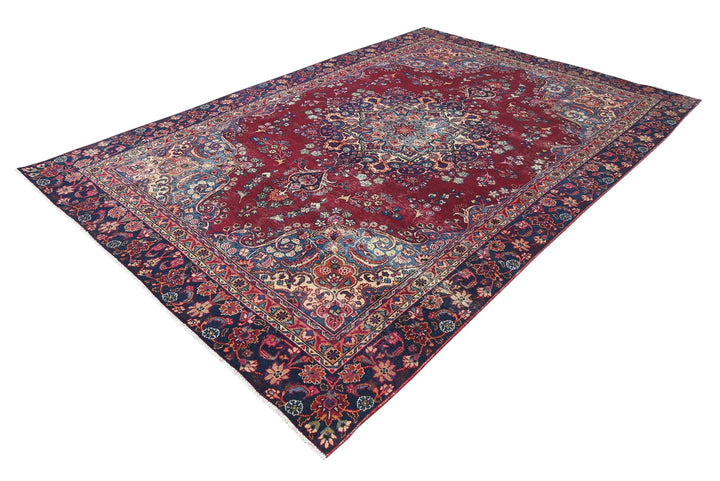 red Large rug 7' 1" x 10' 5"