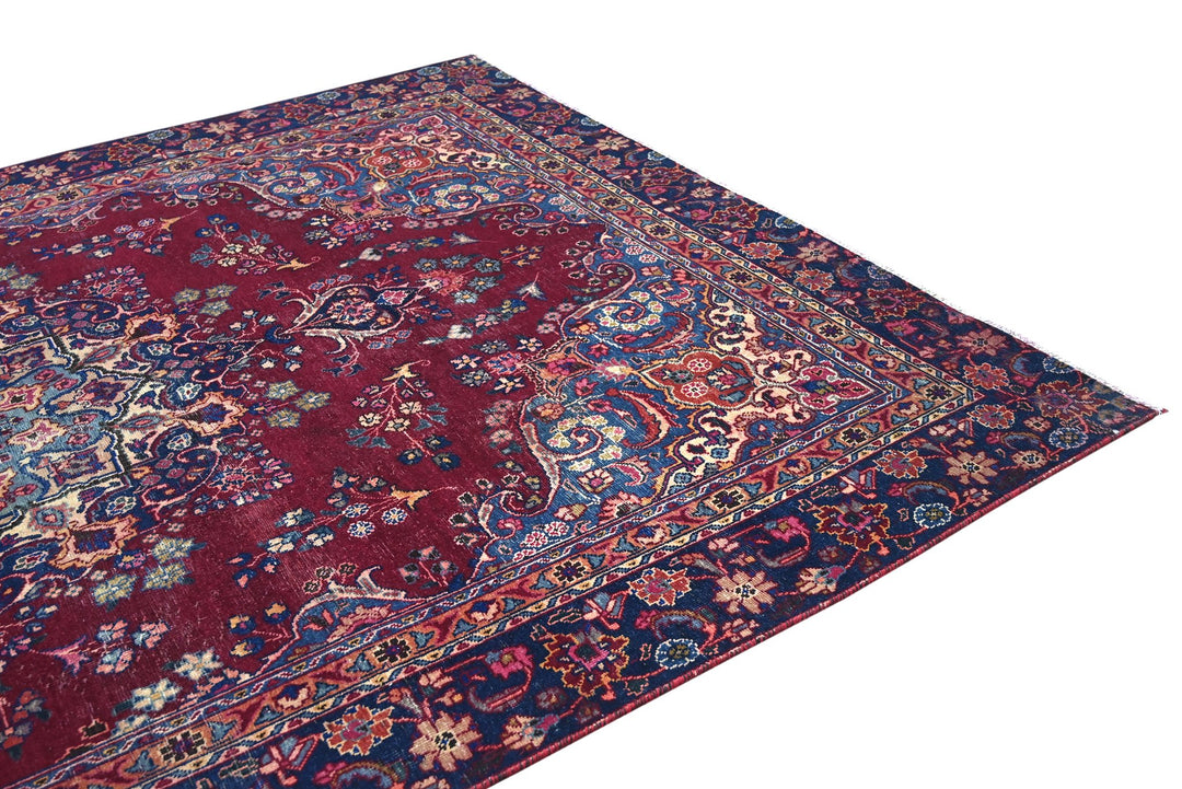 red Large rug 7' 1" x 10' 5"