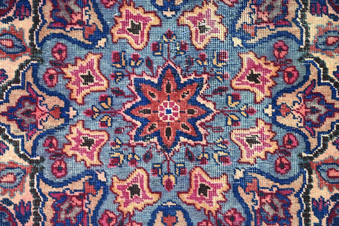 red Large rug 7' 1" x 10' 5"
