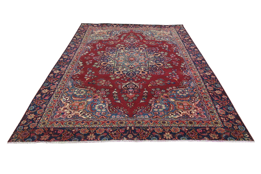 red Large rug 7' 1" x 10' 5"