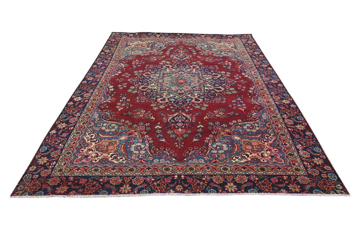 red Large rug 7' 1" x 10' 5"
