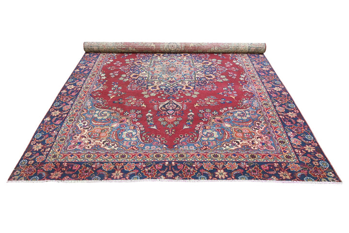 red Large rug 7' 1" x 10' 5"