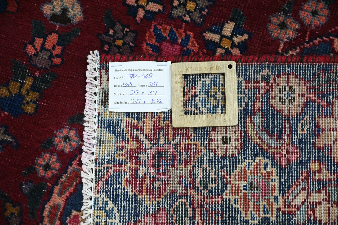 red Large rug 7' 1" x 10' 5"