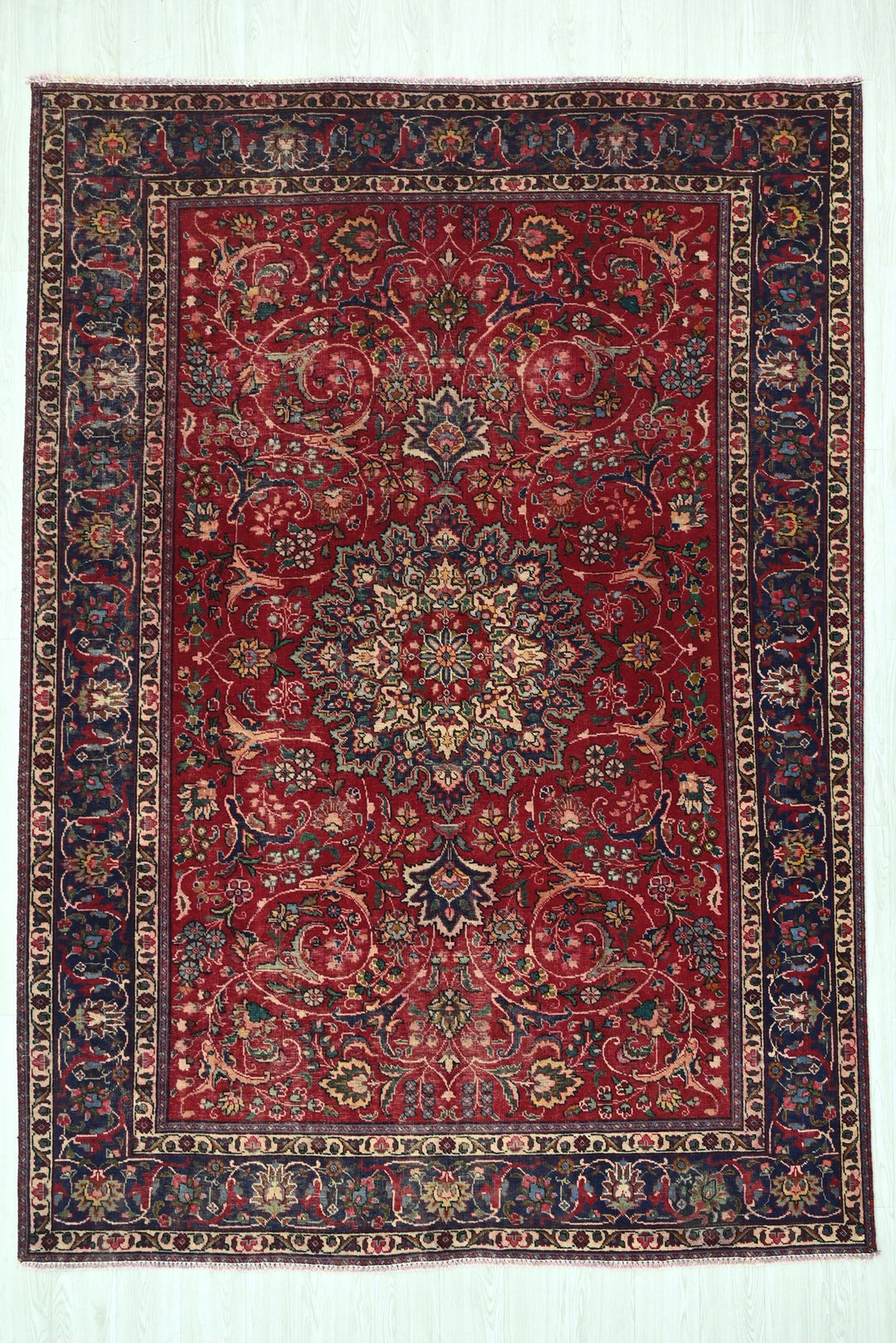 red Large rug 6' 7" x 9' 4"