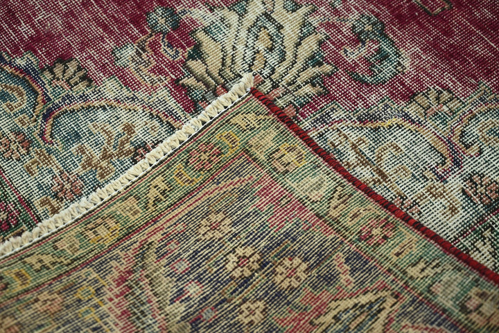 red Medium rug 6' 1" x 9' 3"