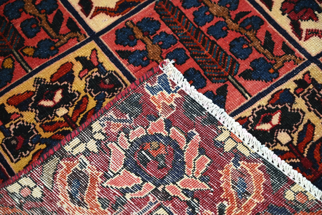 red Large rug 6' 11" x 8' 0"