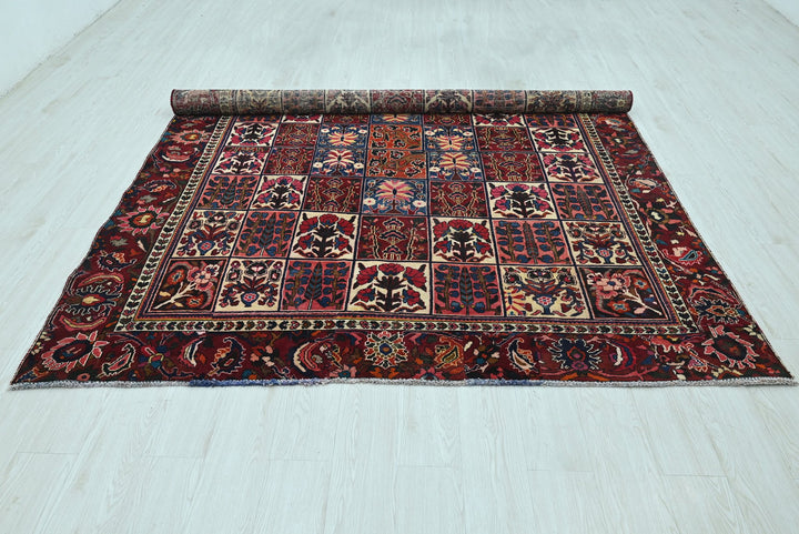 red Large rug 6' 11" x 8' 0"
