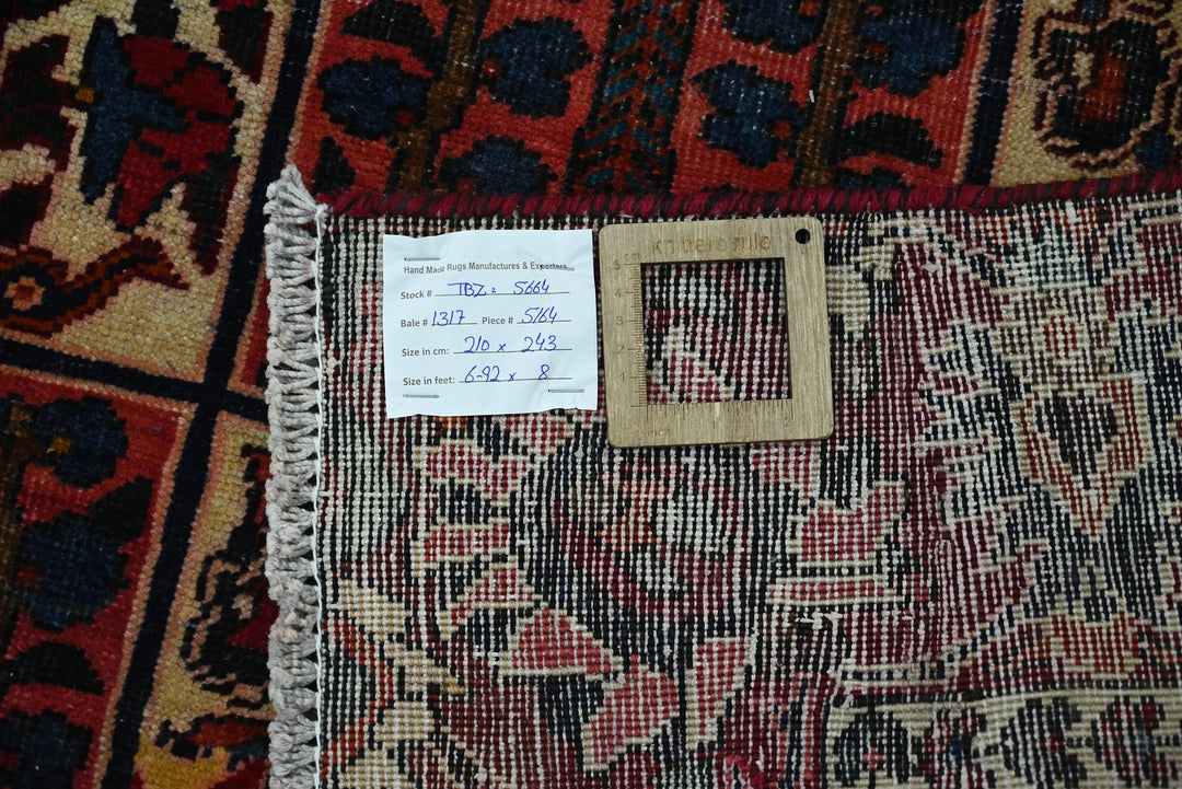red Large rug 6' 11" x 8' 0"